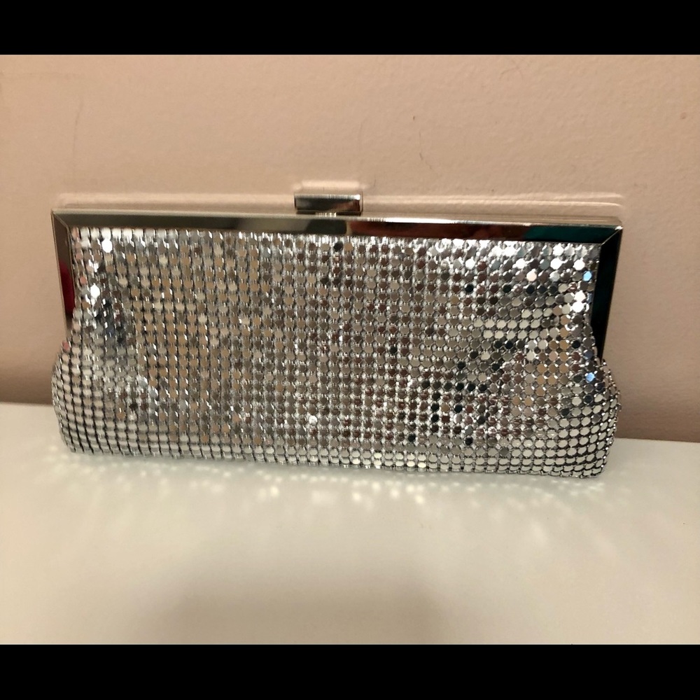 Silver clutch with optional chain strap by Le Regale